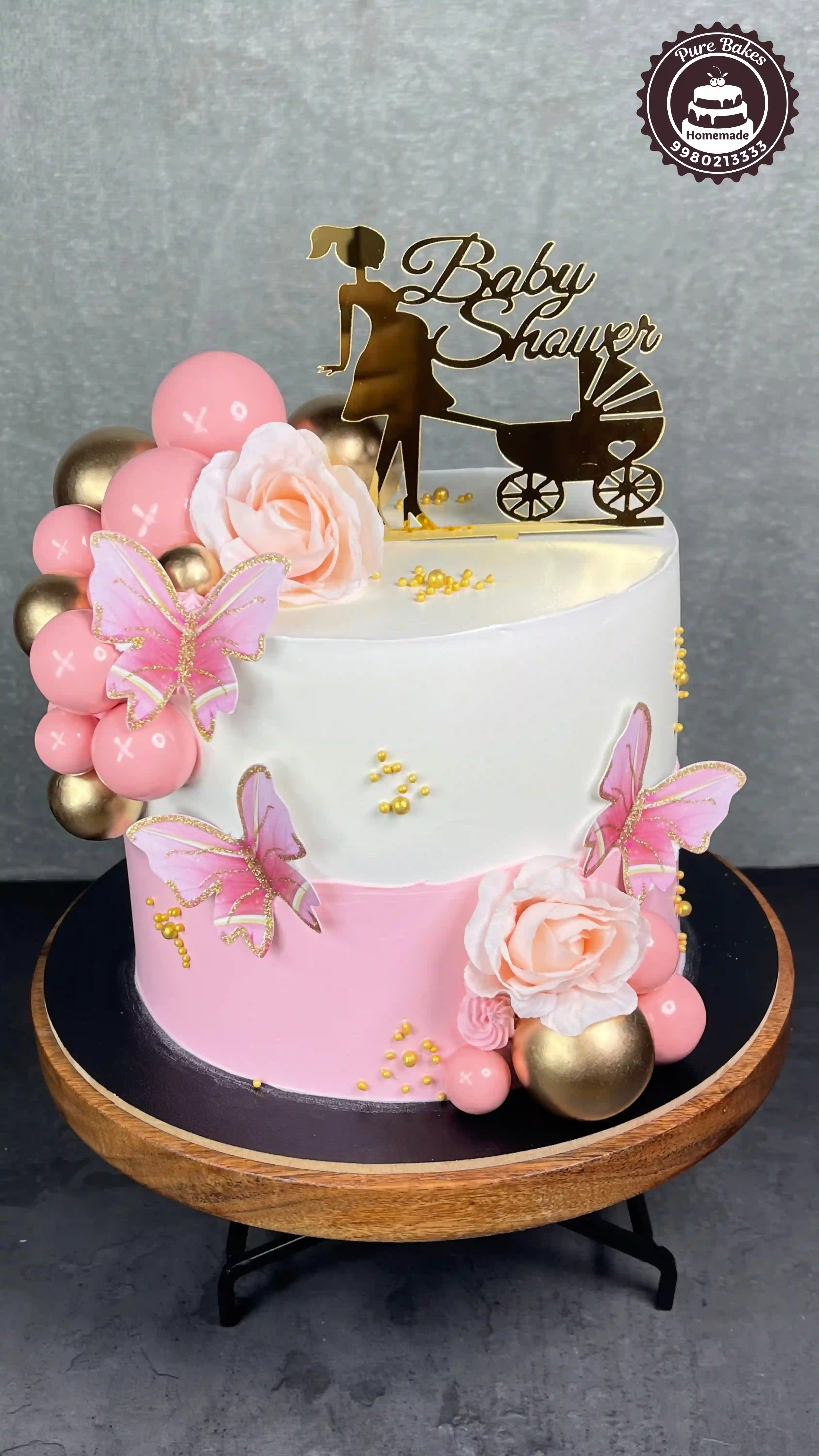Butterfly theme baby shower cake created by PureBakes