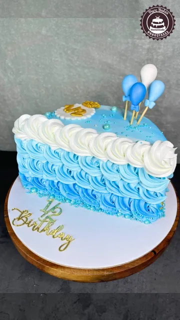 Blue Rosette Half Birthday Celebration Cake