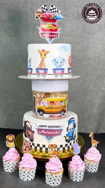Cars Theme Two Tier First Birthday Cake With Animal Cupcakes