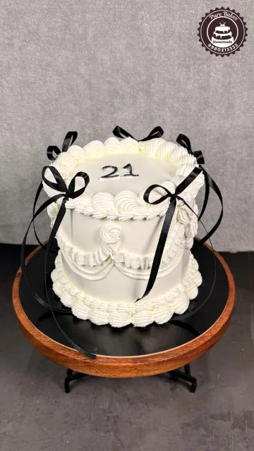 Classic White Vintage Ribbon Birthday Cake for 21st Celebration