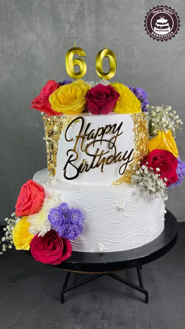 Colorful 60th Birthday Cake with Fresh Roses and Gold
