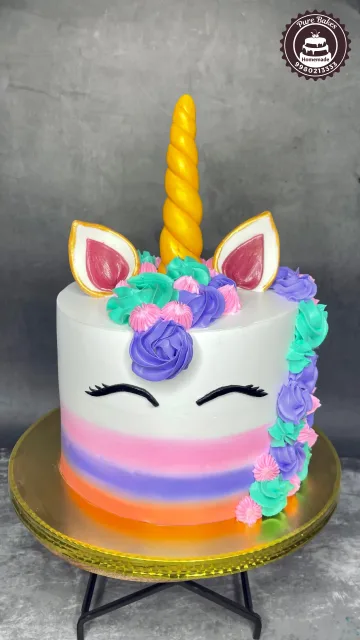 Colorful Unicorn Birthday Cake with Rainbow Frosting Swirls