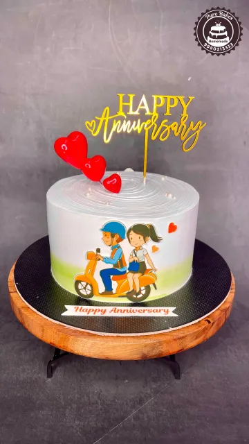 Cute Couple Scooter Anniversary Cake