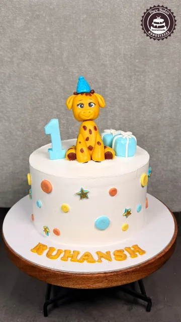 Cute Giraffe First Birthday Cake with Colorful Fondant Decorations