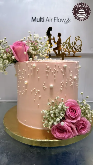 Elegant Engagement Cake with Roses and Just Engaged Topper