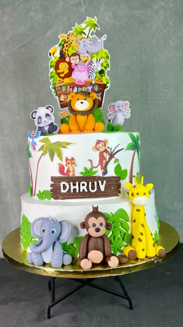 Jungle Safari First Birthday Cake with Cute Animal Toppers