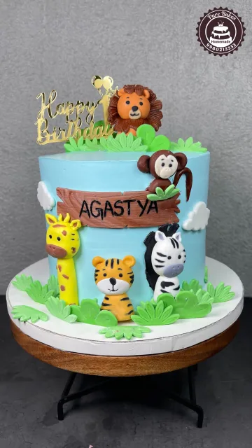 Jungle Theme First Birthday Cake with Cute Animal Fondant Toppers