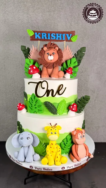 Jungle Theme First Birthday Cake With Cute Animal Toppers