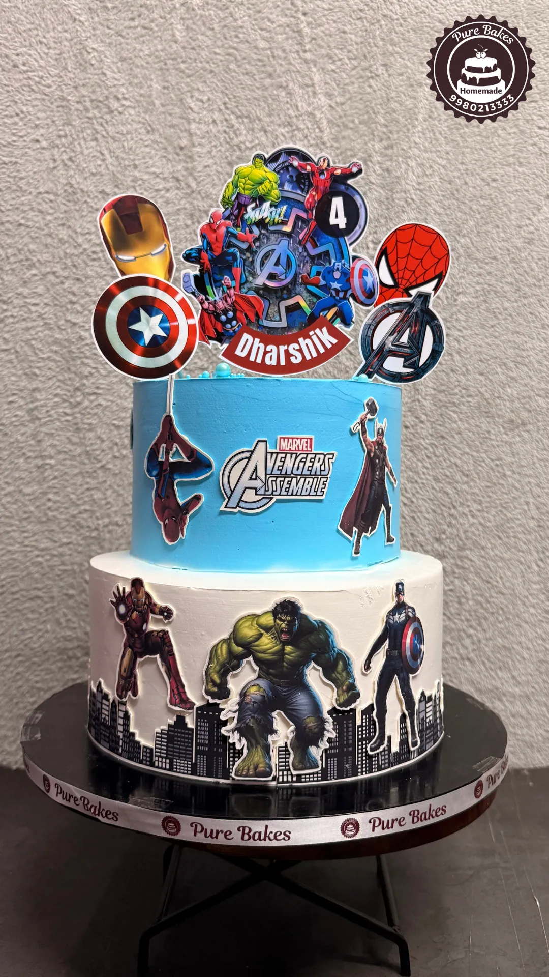 Two-tier Marvel Avengers superhero birthday cake created by PureBakes