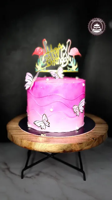 Pink Butterfly Birthday Cake with Flamingo Cake Topper