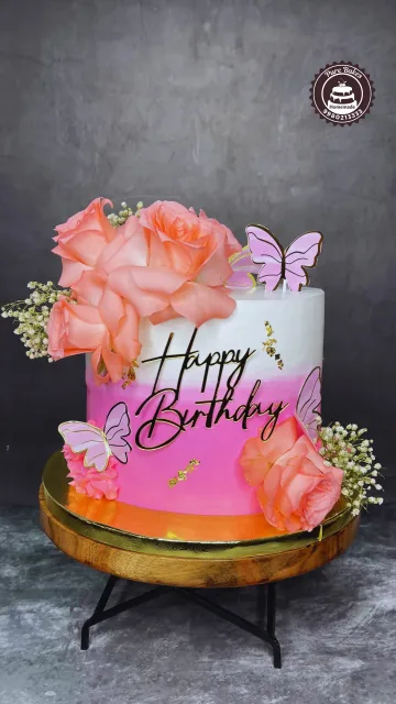 Pink Butterfly Birthday Cake with Fresh Rose Decorations