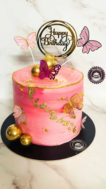 Pink Butterfly Birthday Cake with Gold Foil Decorations