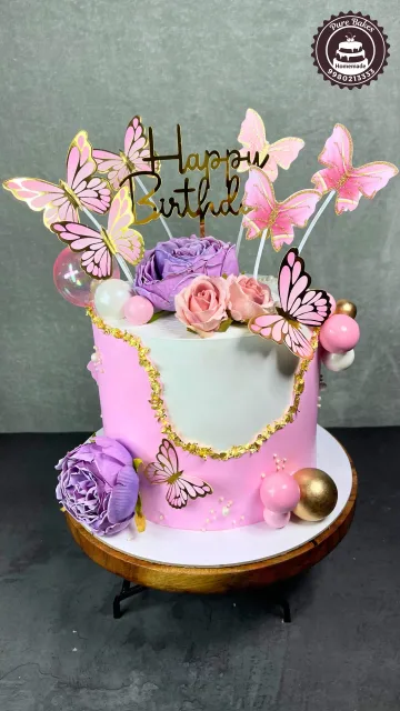 Pink Butterfly Birthday Cake with Roses and Gold Accents