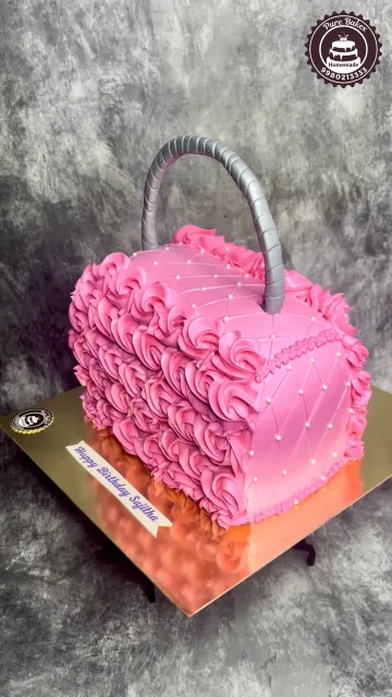Pink Handbag Shaped Birthday Cake with Rosette Design