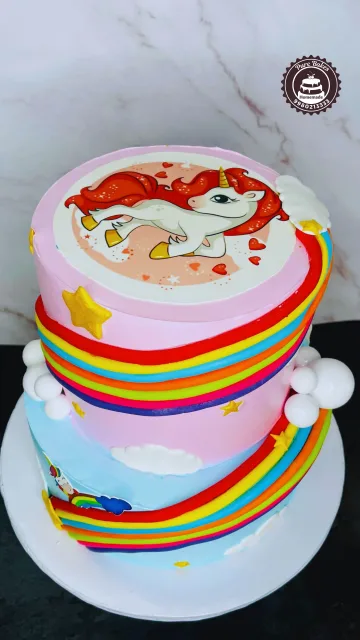 Rainbow Unicorn Cake with Colorful Fondant Stripes Design