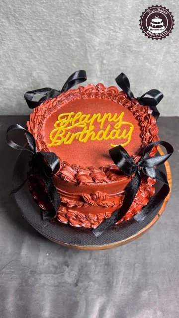 Rich Chocolate Birthday Cake With Black Ribbon Bow Design