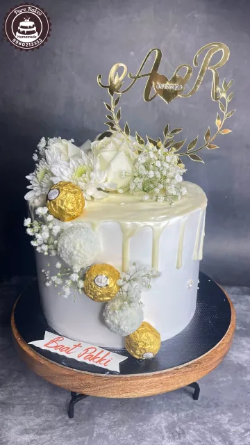 White Drip Engagement Cake
