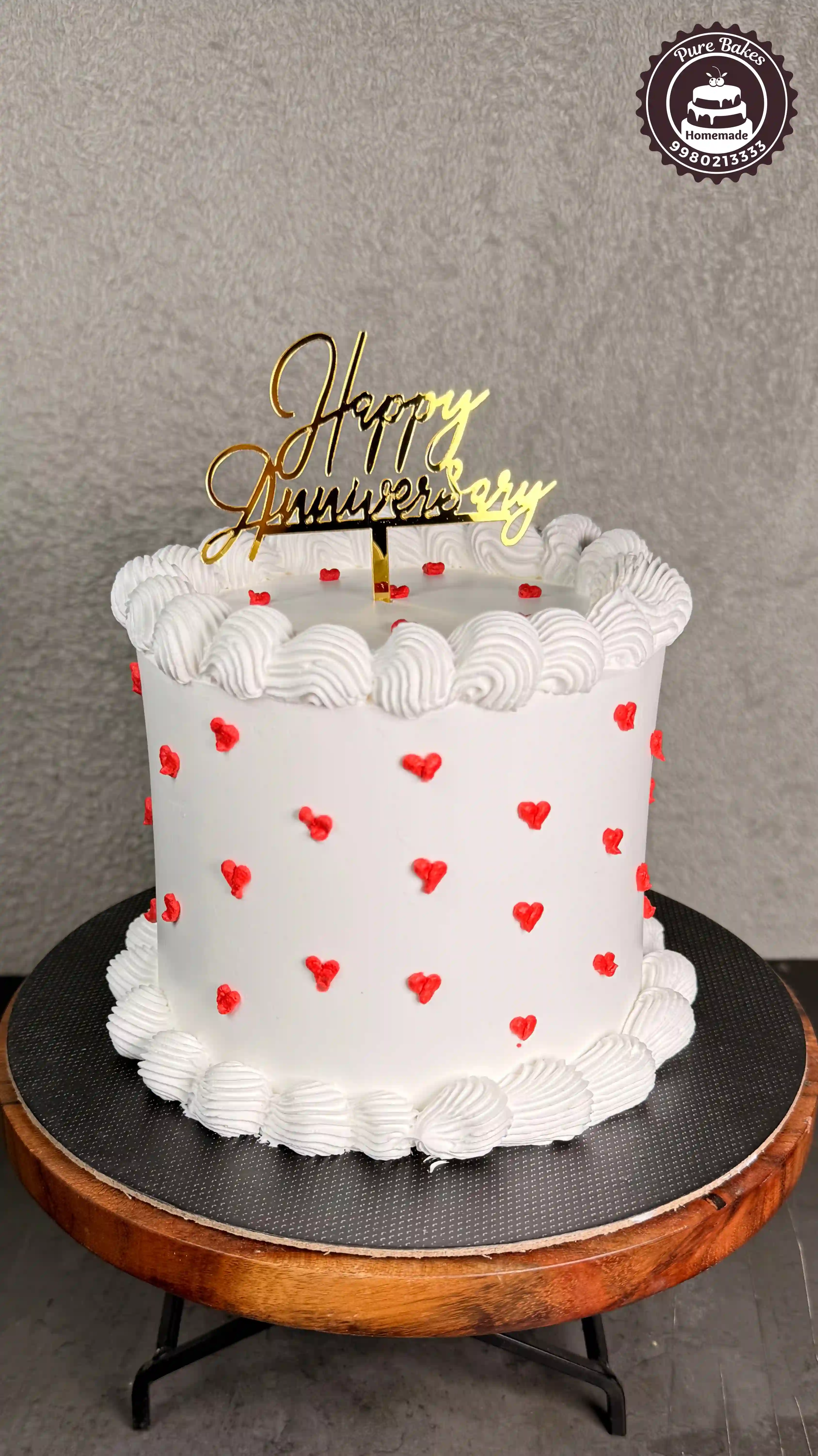 Elegant White Heart Anniversary Cake
