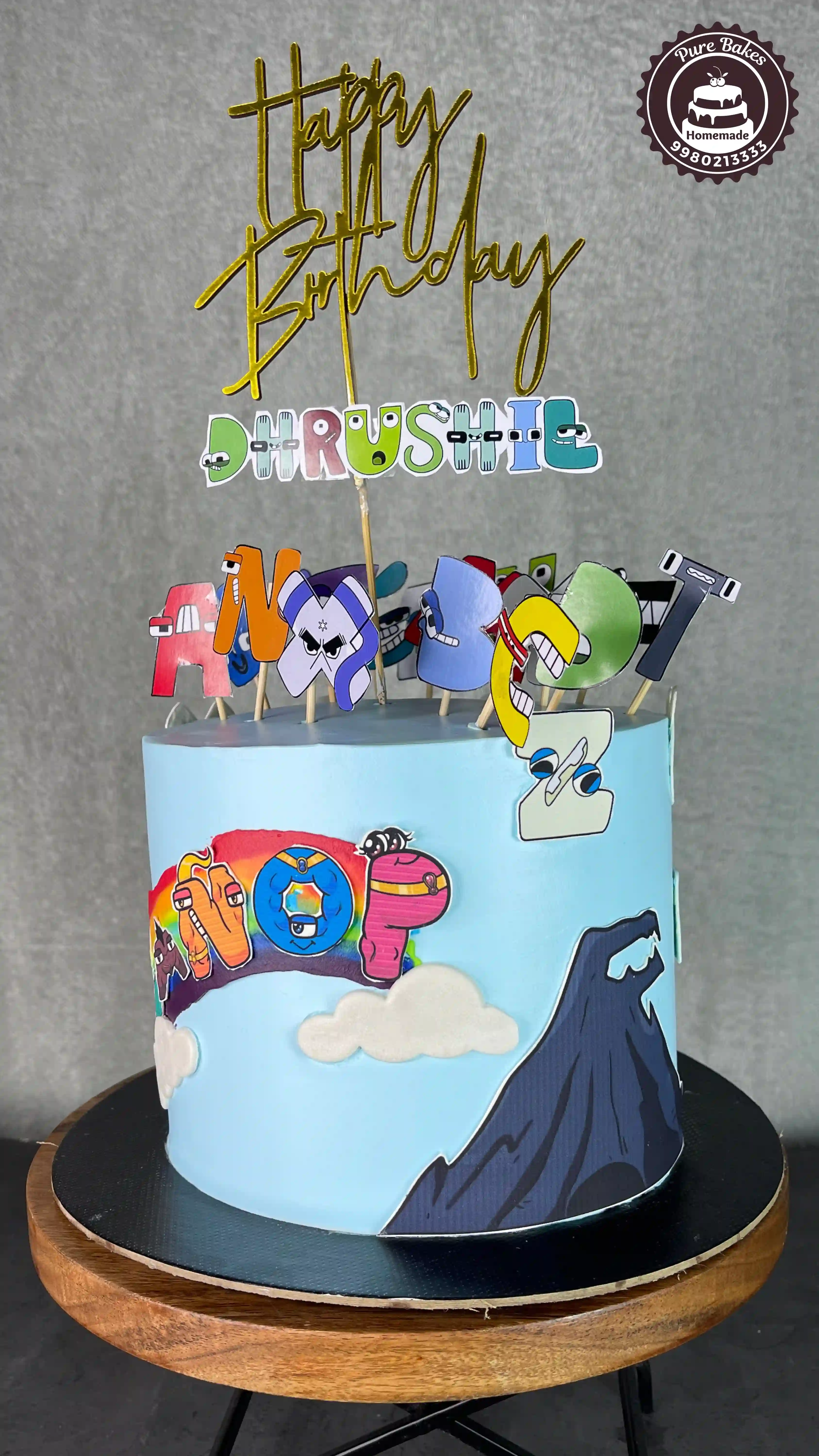 Alphabet Lore Kids Birthday Cake with Cartoon Letter Decorations