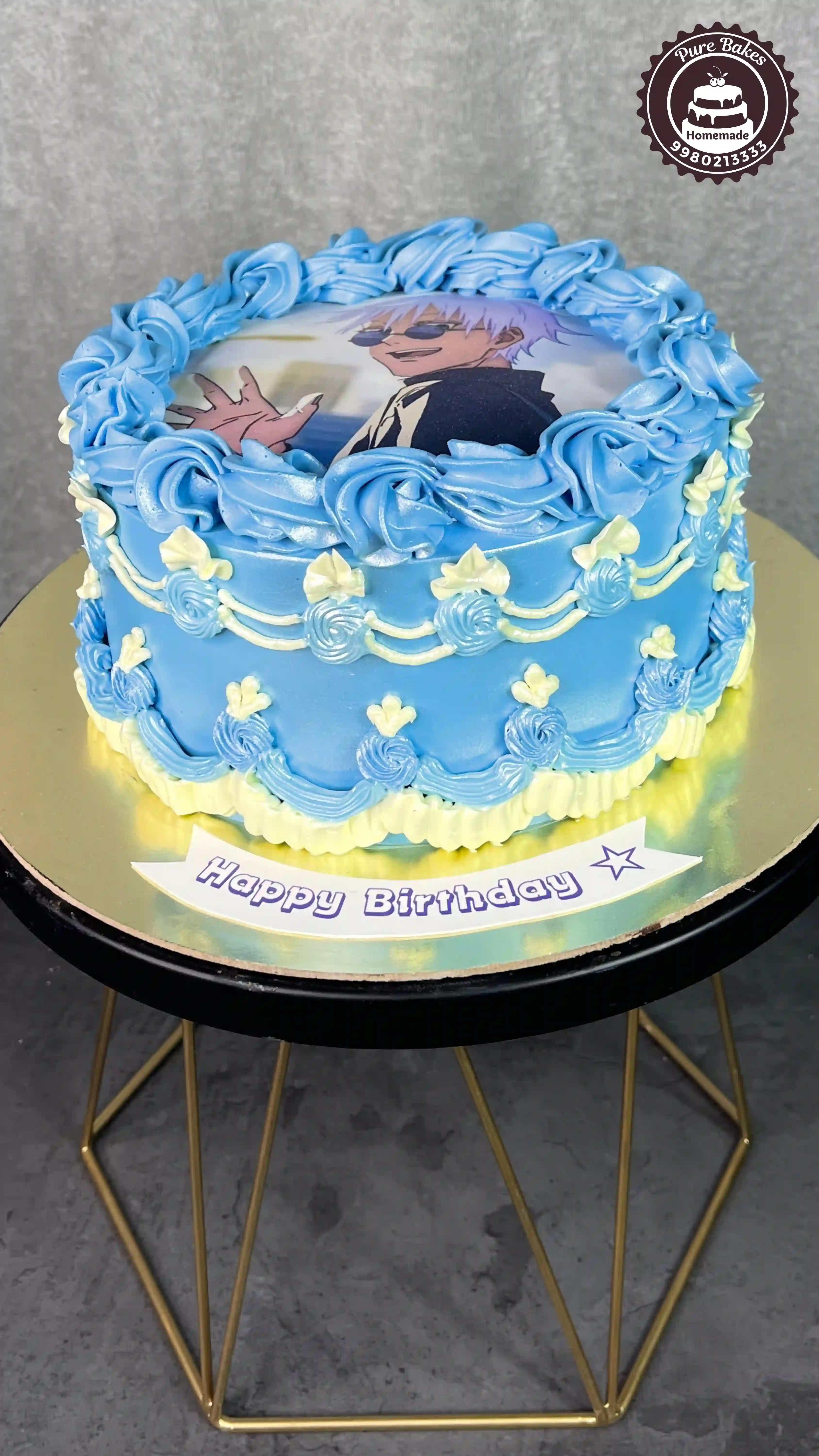 Anime Character Birthday Cake with Blue Buttercream Swirl Design