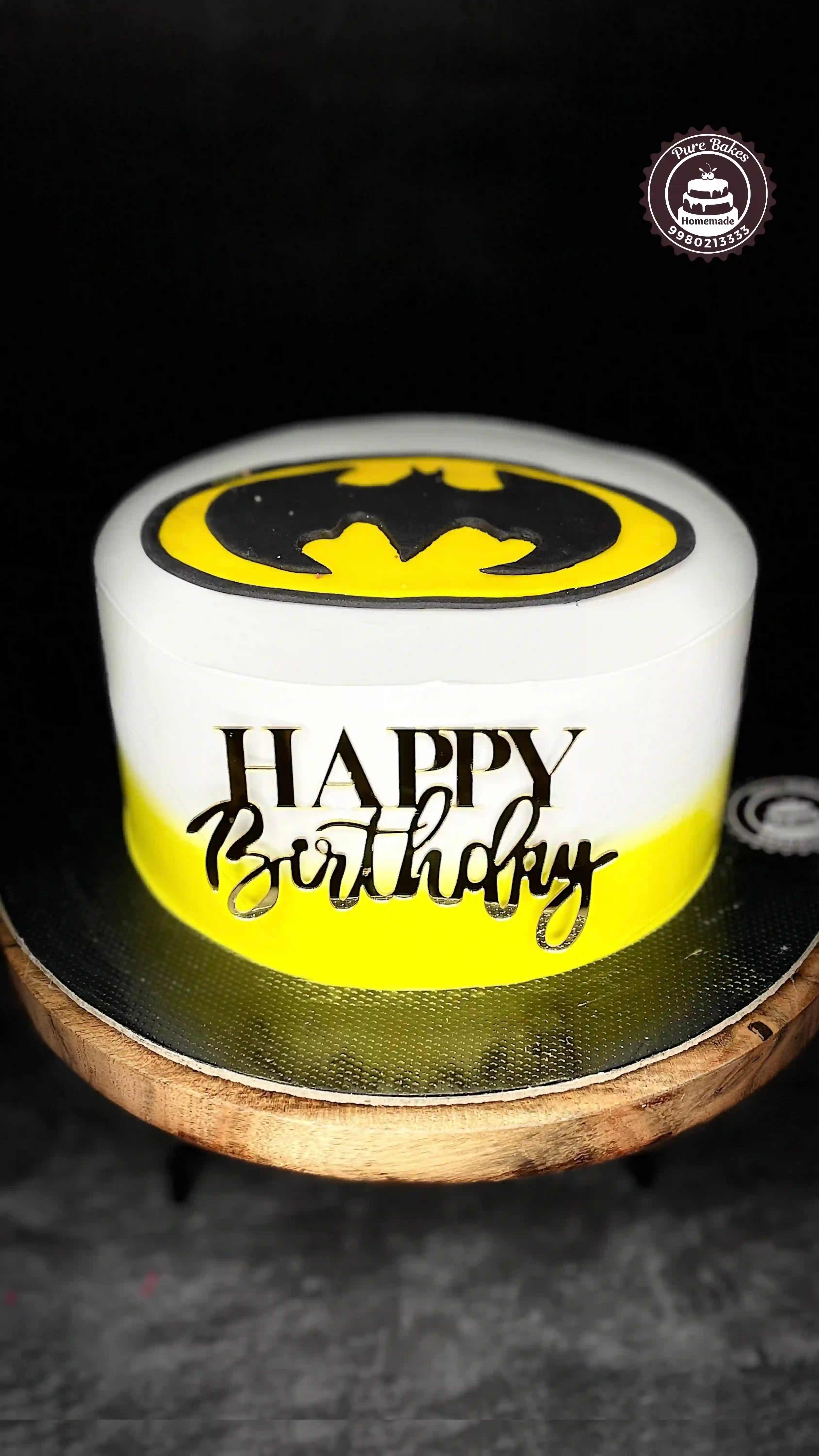 Batman Theme Birthday Cake with Bold Yellow Design