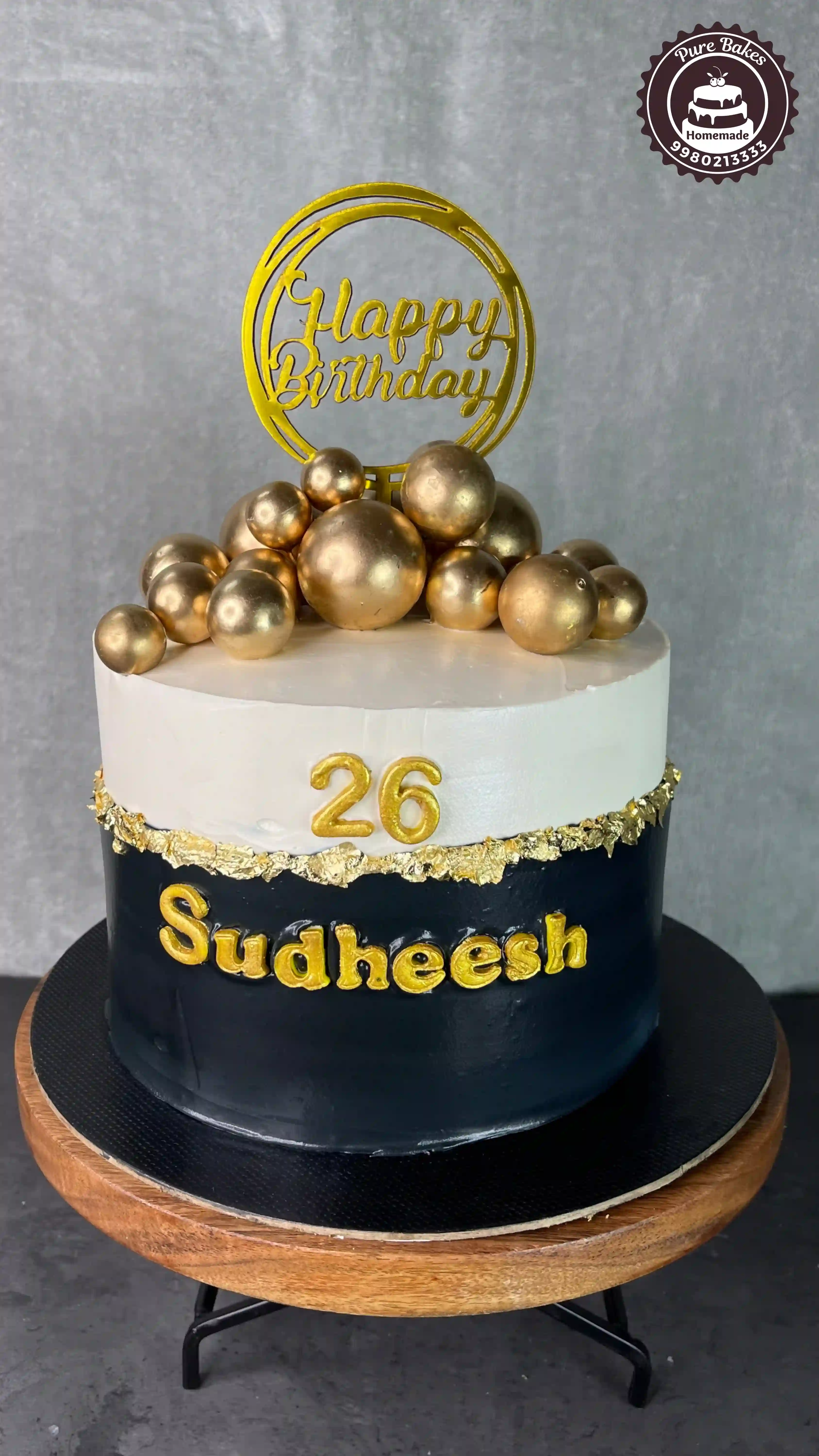 Black and Gold Birthday Cake with Custom Name Topper