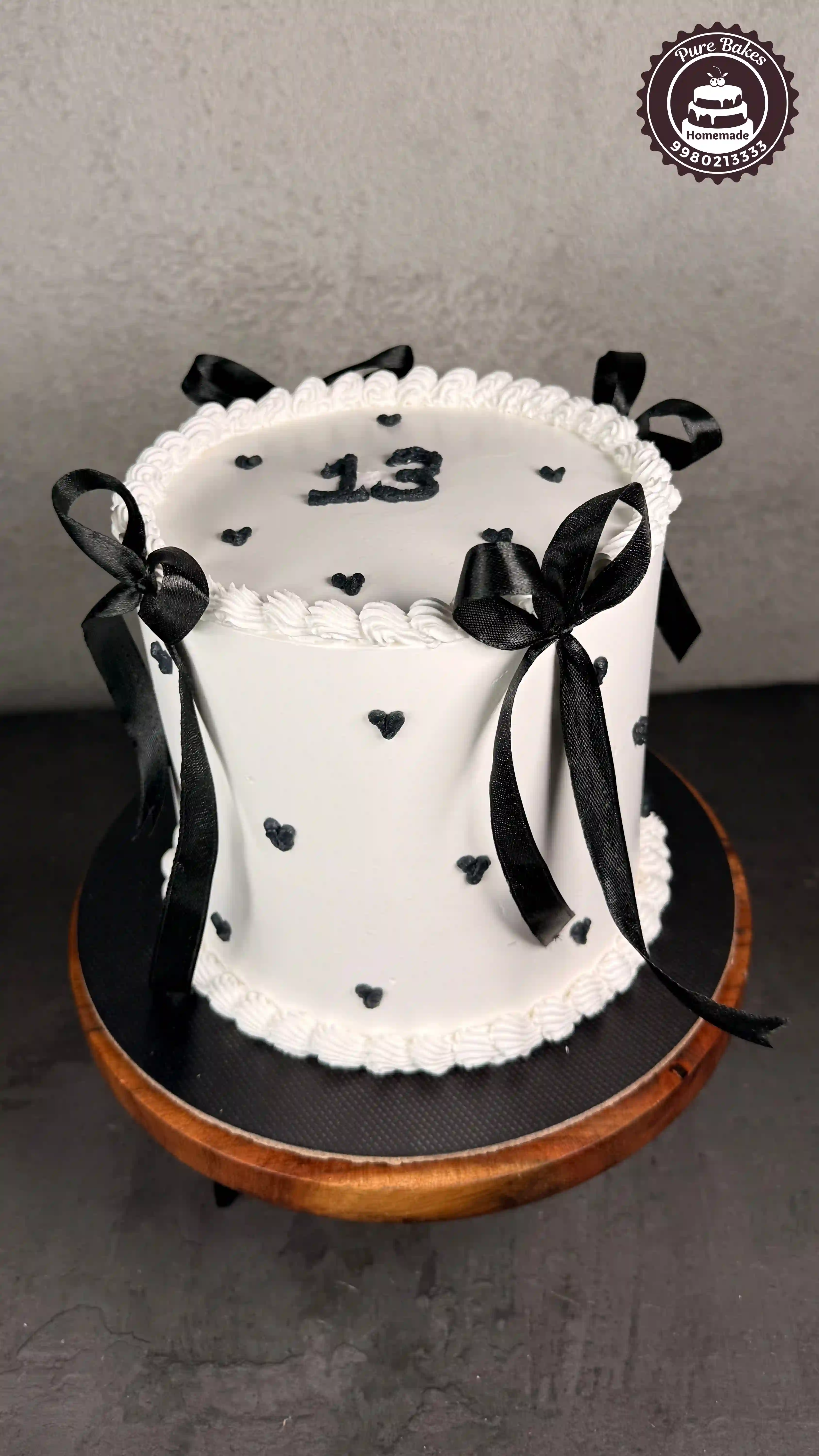 Black and White Bow Cake for Trendy Teen Birthday Celebration