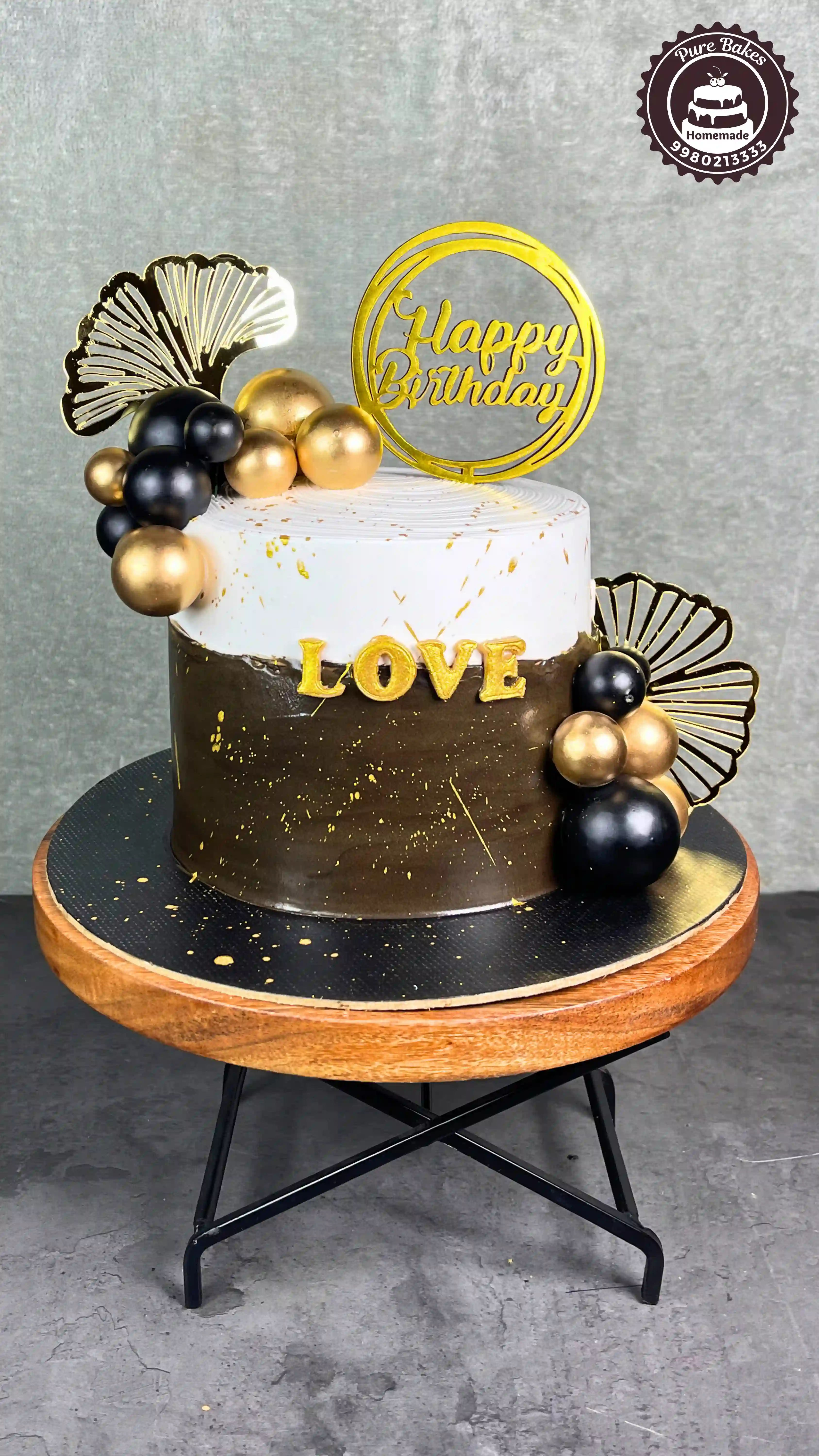 Black Gold Birthday Cake with Modern Party Theme