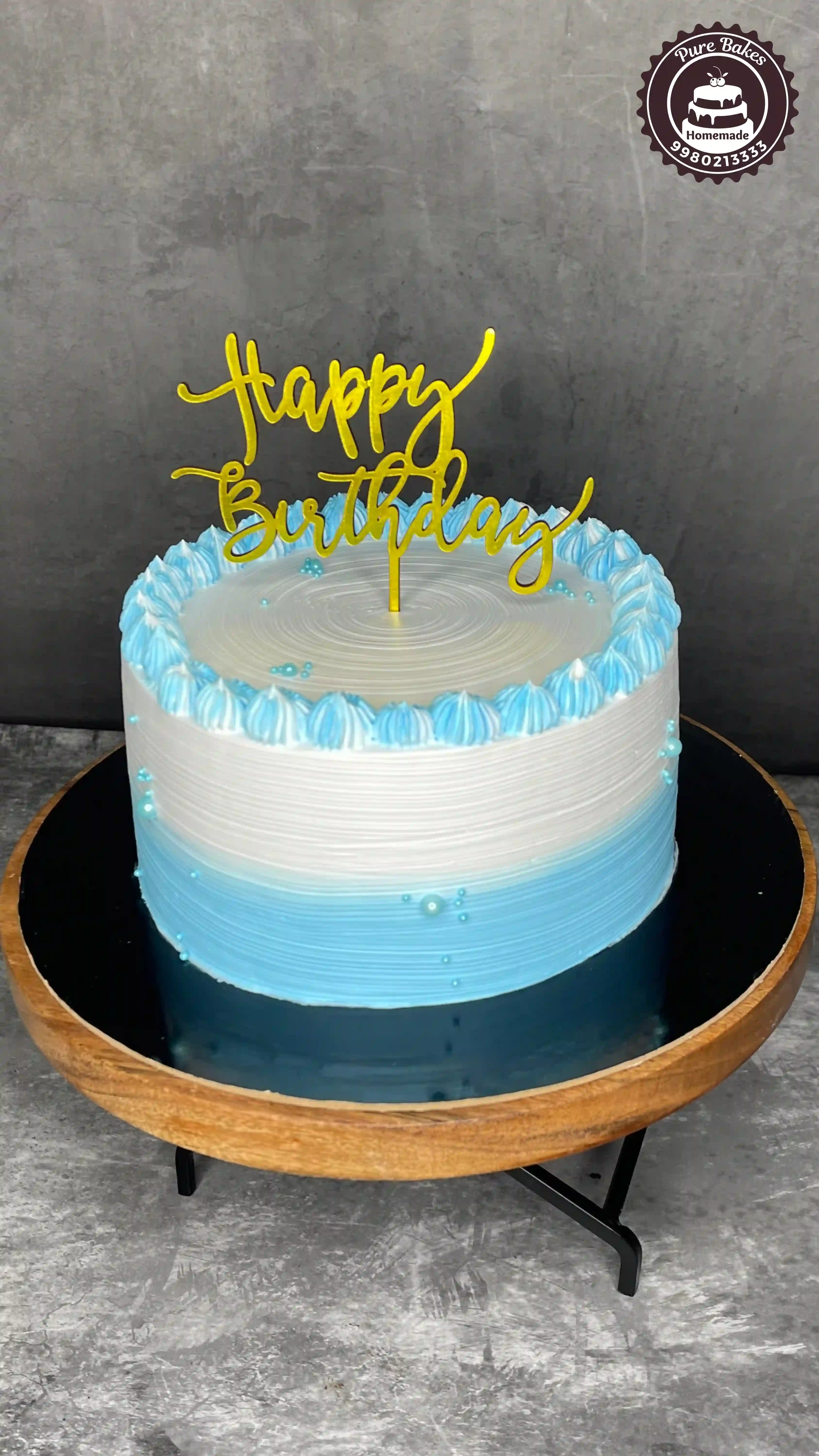 Blue and White Buttercream Birthday Cake with Gold Topper