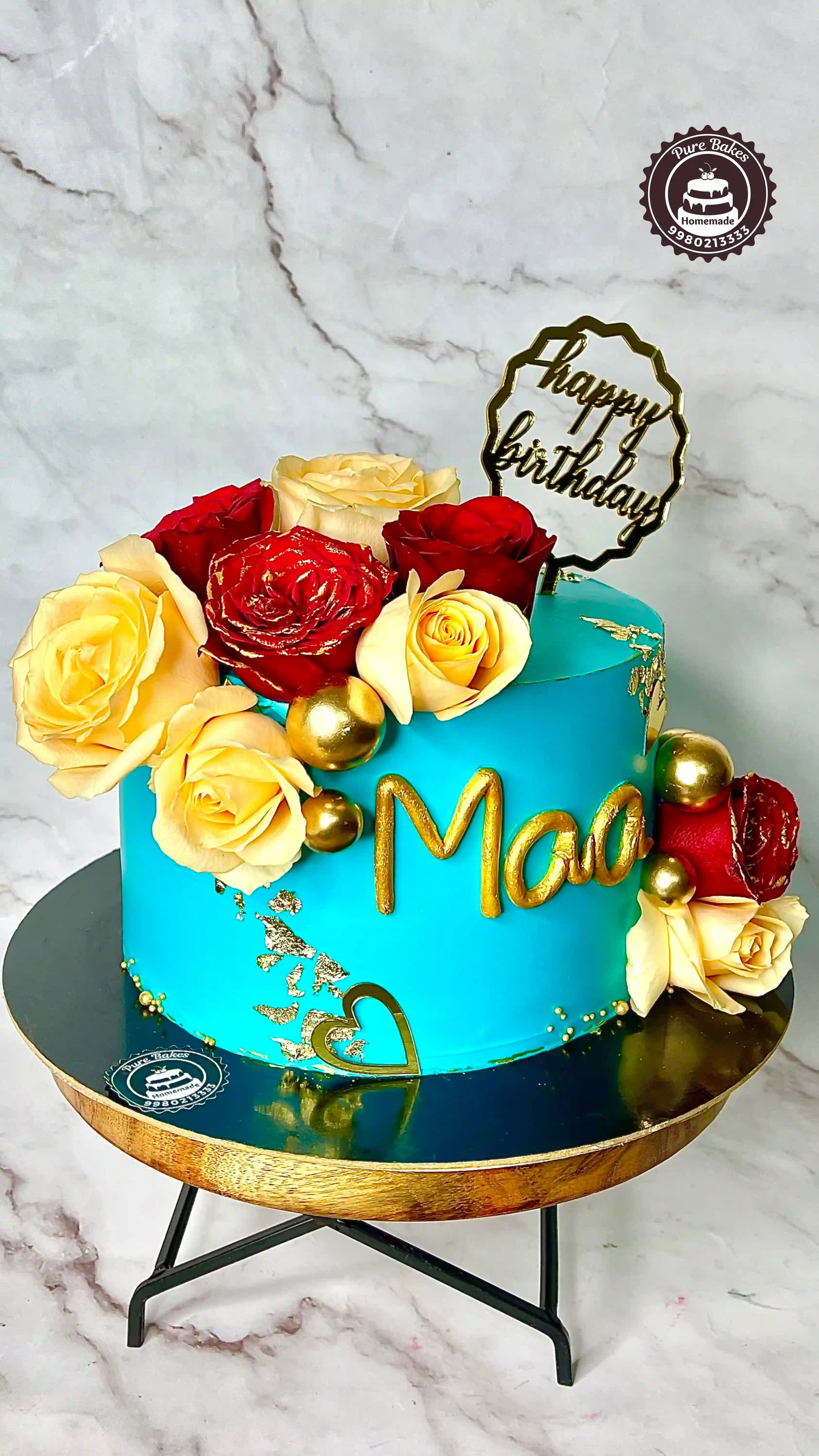 Blue Birthday Cake with Roses and Golden Name Topper