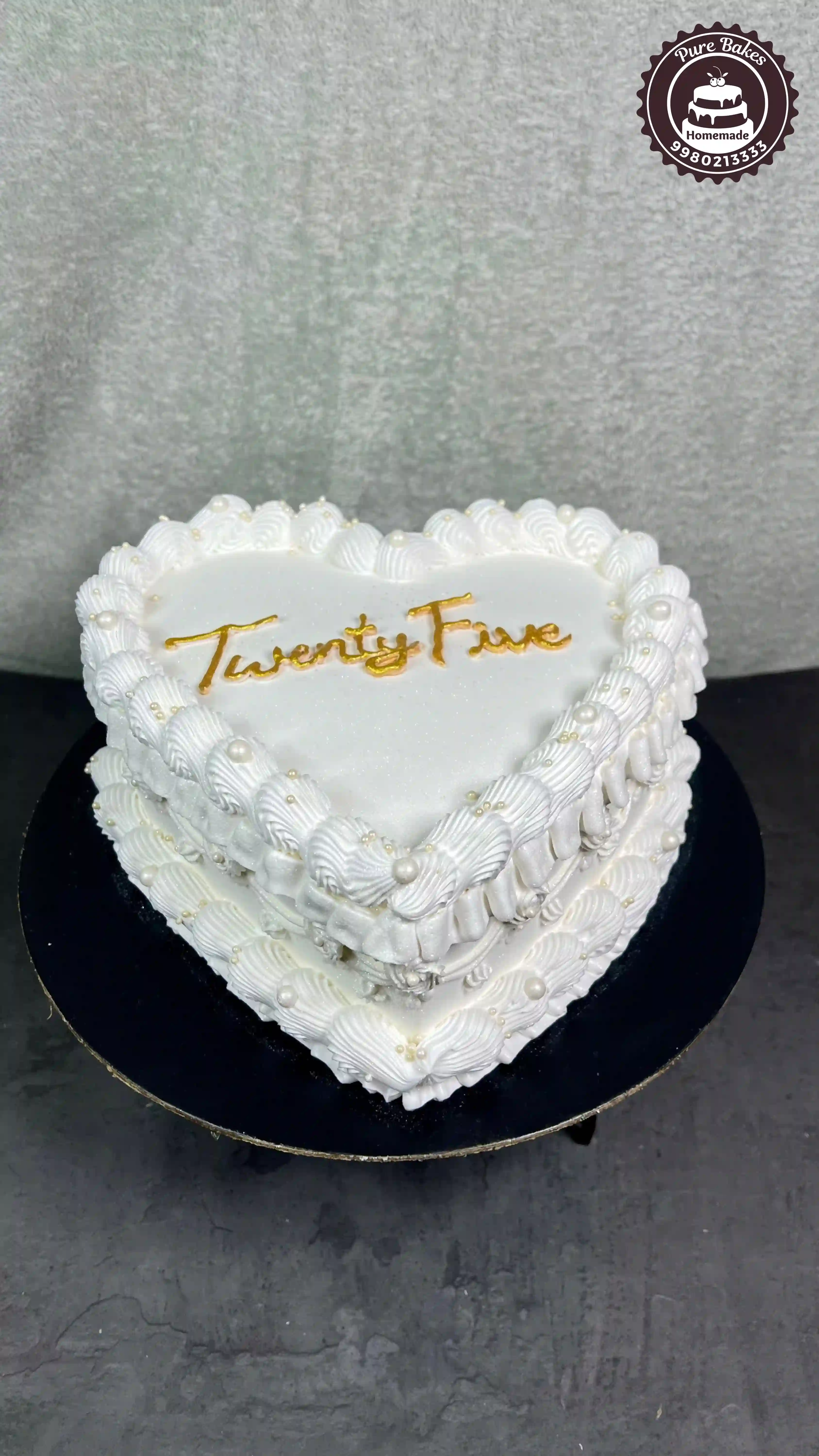 Heart Shaped White Cream Cake with Golden Twenty Five