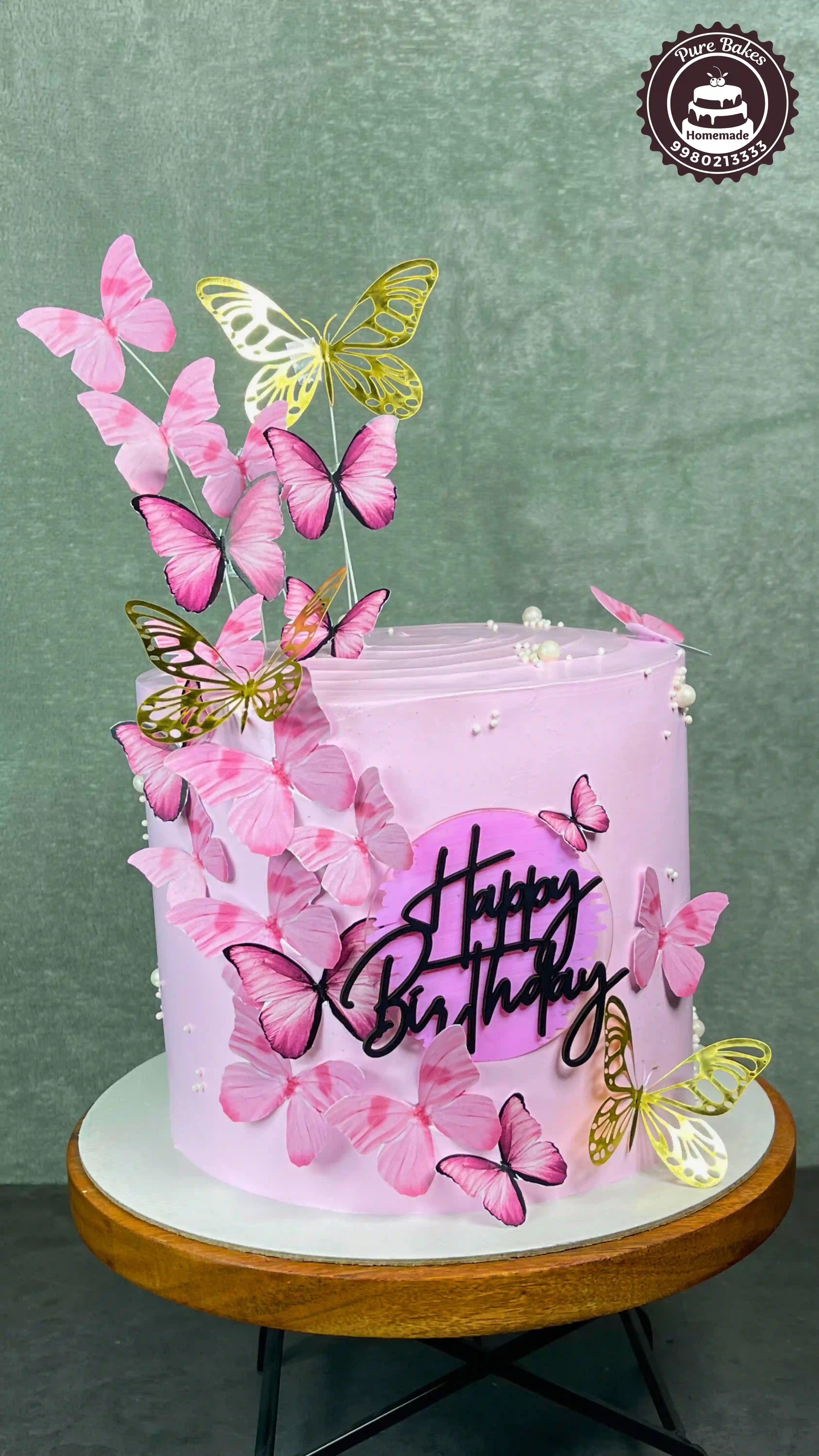 Pink Butterfly Birthday Cake with Floating Butterfly Decorations
