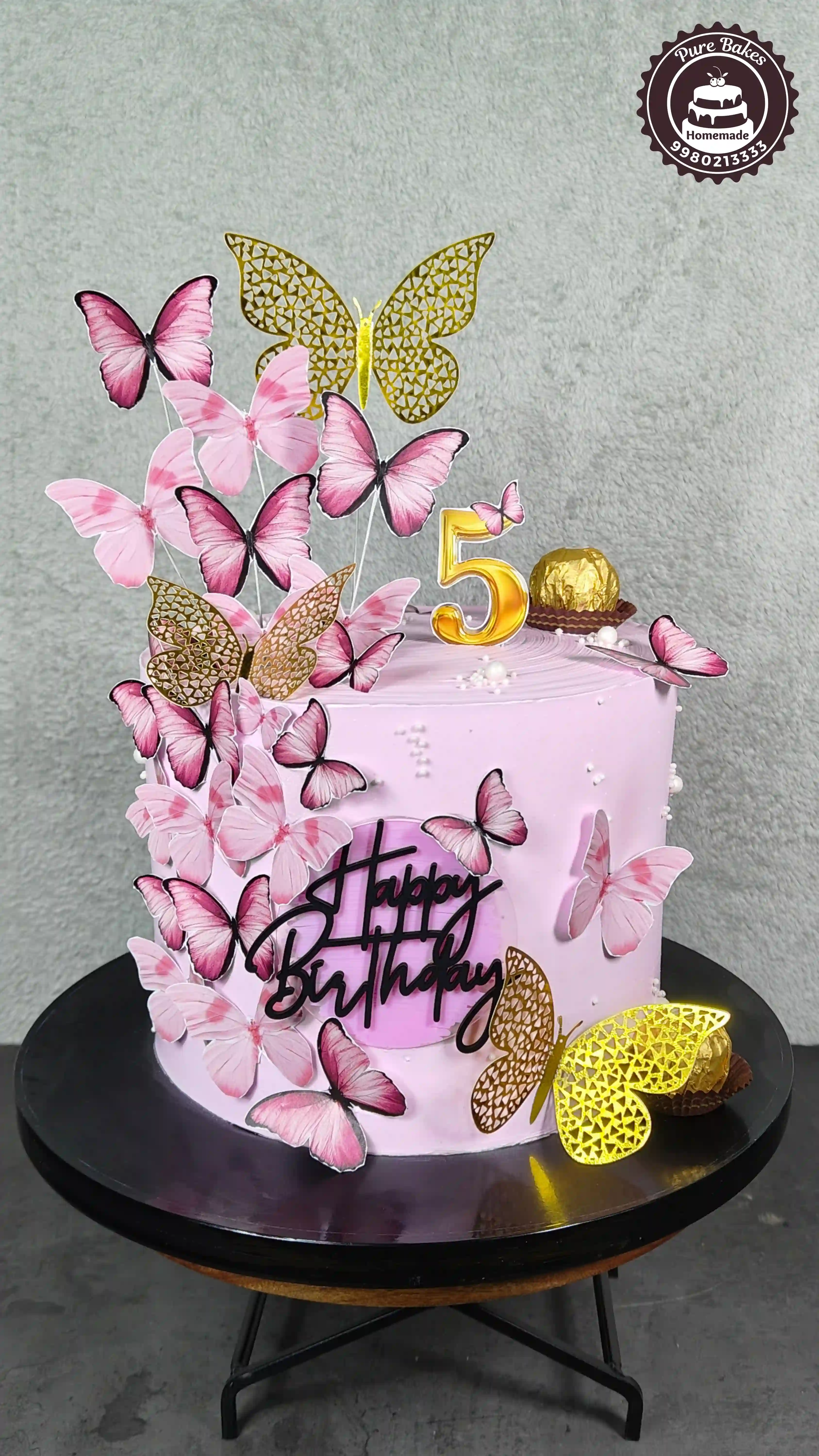 Pink Butterfly Birthday Cake with Gold Topper and Decorations