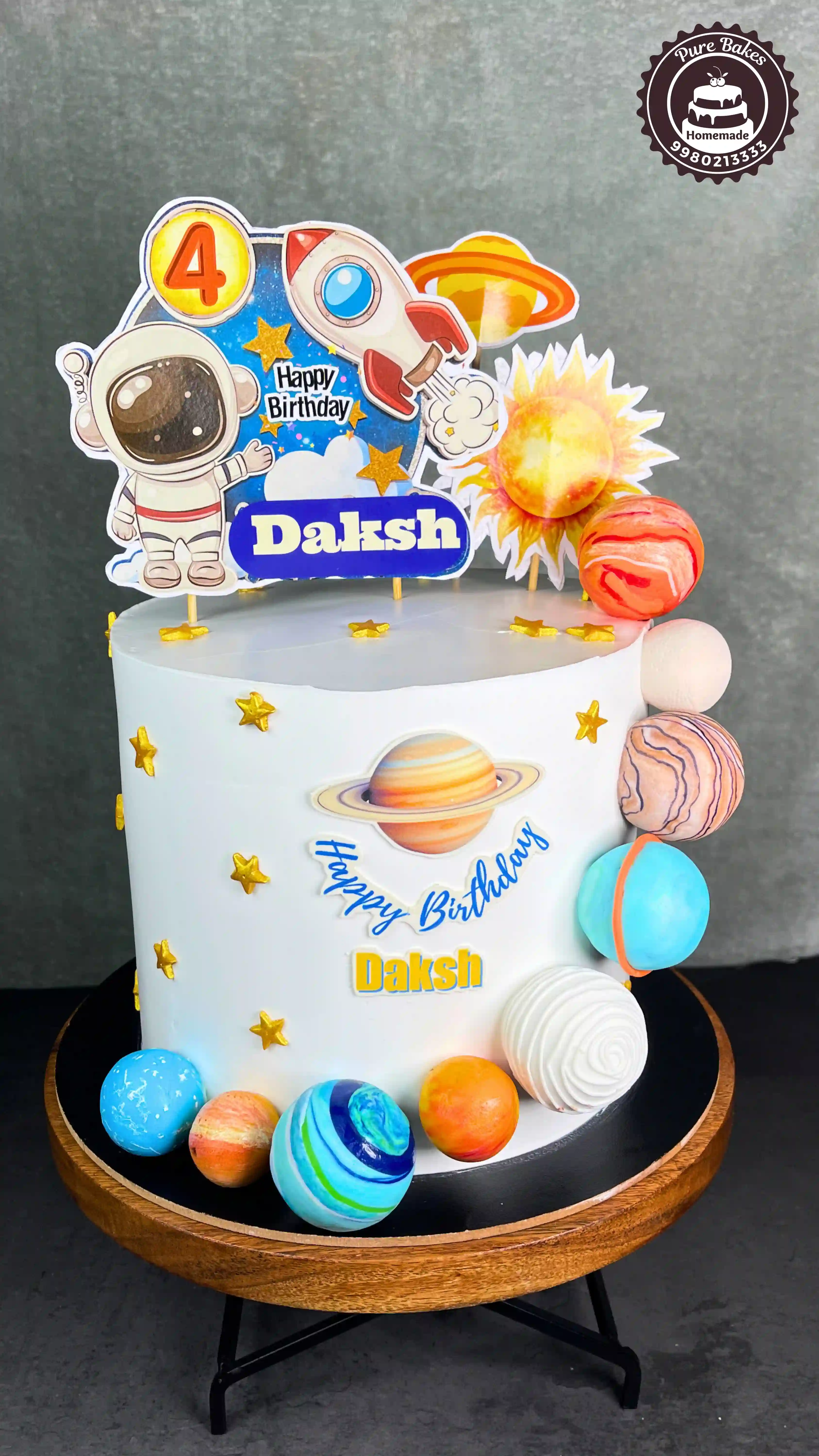 Space Theme Birthday Cake with Astronaut and Planet Decorations