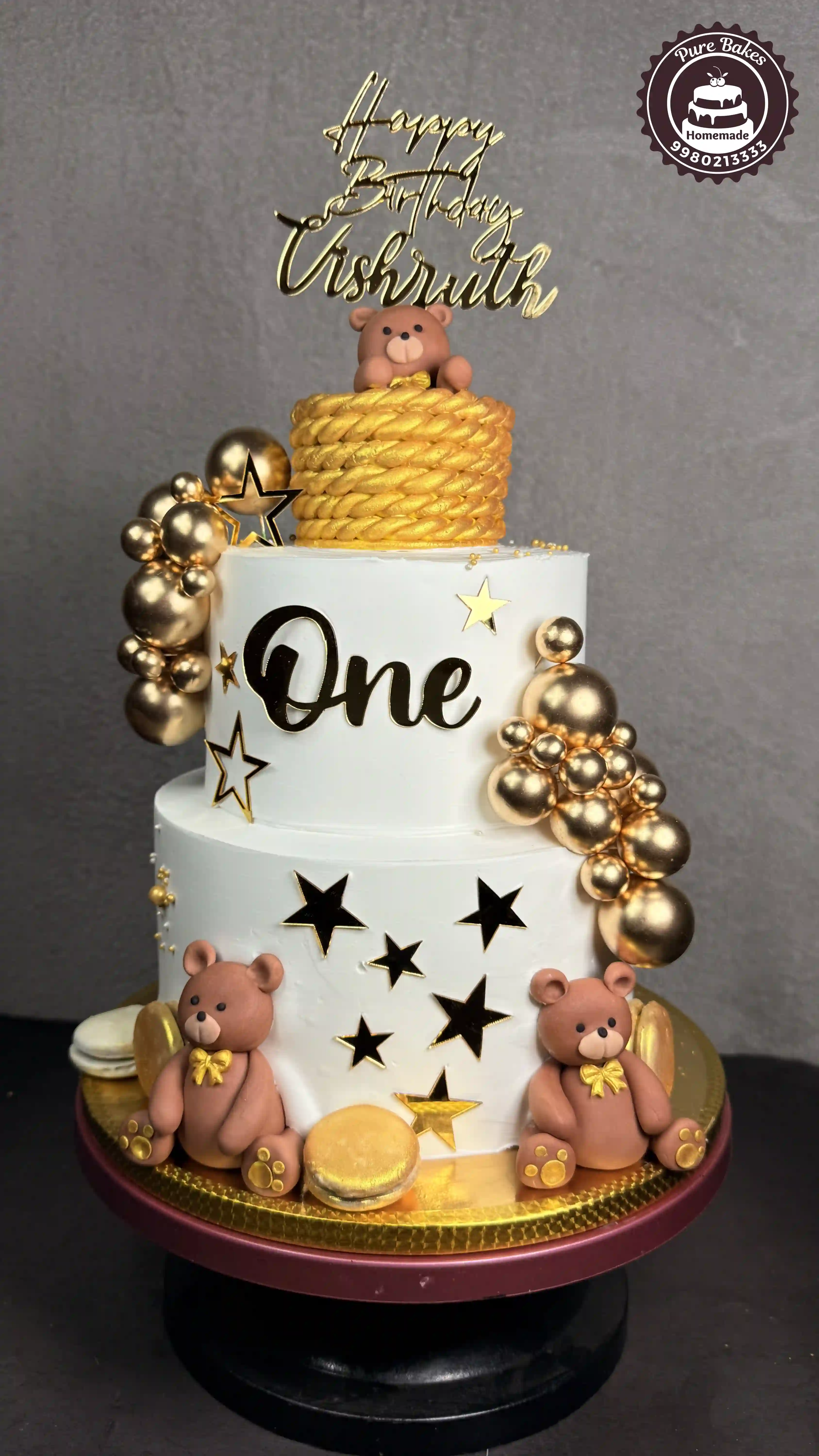 Teddy Bear First Birthday Cake With Gold Balloon Decorations