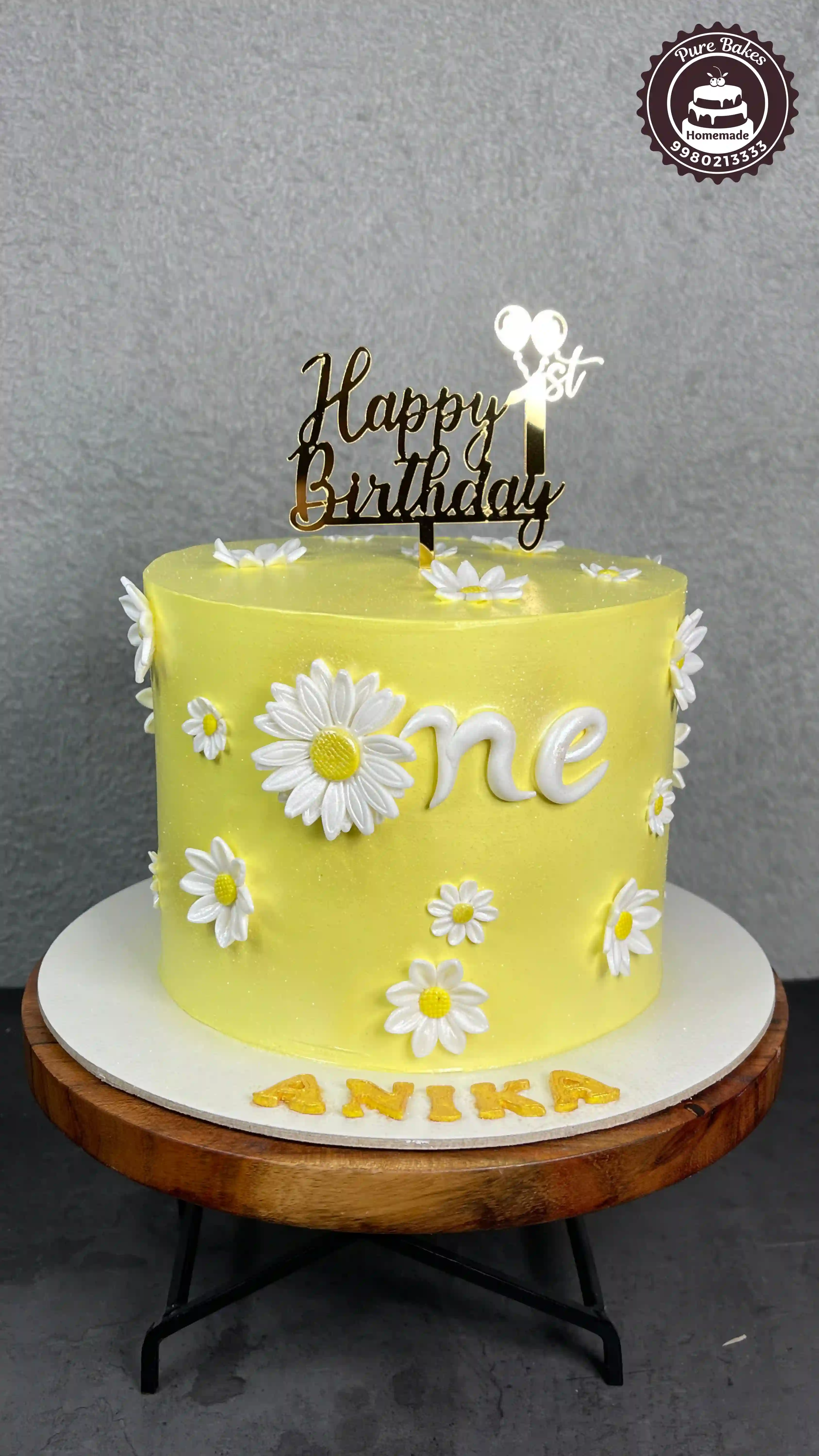 Yellow Daisy First Birthday Cake for Baby Girl Celebration